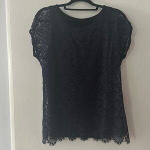 Women’s navy lace blouse.
